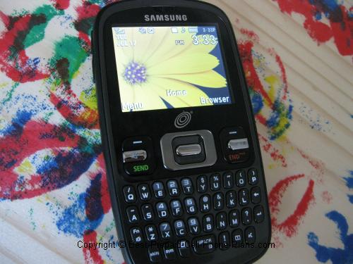 Samsung R355c with flower wallpaper graphic